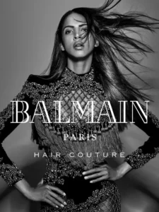 Campaña de Balmain Paris Hair Couture con un diseño de Olivier Rousteing, mostrando una modelo con un vestido adornado y elegante.