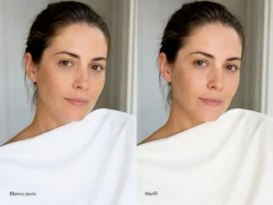 Comparativa de colorimetría junto al rostro entre blanco puro y marfil para observar cuál armoniza mejor con la piel.